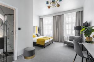 Posteľ alebo postele v izbe v ubytovaní Old Town Residence Aparthotel