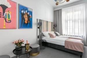 Posteľ alebo postele v izbe v ubytovaní Old Town Residence Aparthotel