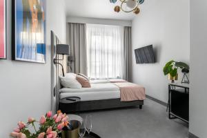Posteľ alebo postele v izbe v ubytovaní Old Town Residence Aparthotel