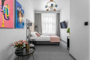 Posteľ alebo postele v izbe v ubytovaní Old Town Residence Aparthotel