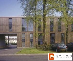 a building with a car parked in front of it at ByEvo 1 Brabloch - perfect for contractors - Close to GLA in Paisley