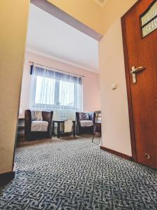Posedenie v ubytovaní Hotel Na Wzgórzu