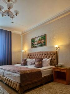 Cama o camas de una habitación en Hotel Asia Bukhara