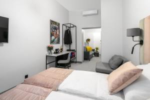 Posteľ alebo postele v izbe v ubytovaní Old Town Residence Aparthotel