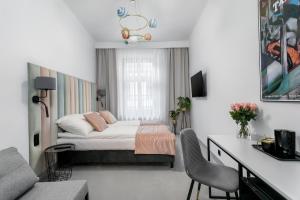 Posteľ alebo postele v izbe v ubytovaní Old Town Residence Aparthotel