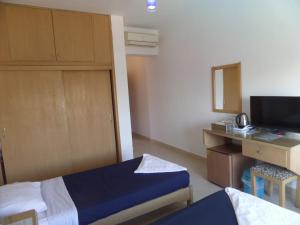 Lova arba lovos apgyvendinimo įstaigoje Red Sea Relax Hotel