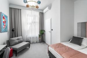 Posteľ alebo postele v izbe v ubytovaní Old Town Residence Aparthotel