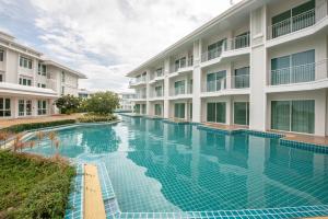 Bazén v ubytování One Bedroom BeachfrontPoolfront Located In Cha-amHua Hin nebo v jeho okolí