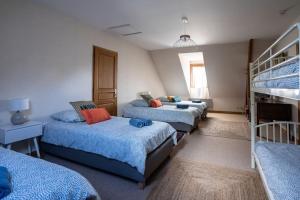 Posteľ alebo postele v izbe v ubytovaní Villa avec piscine entre Beauval et châteaux*