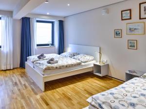 Una cama o camas en una habitación de Innheaven Apartments