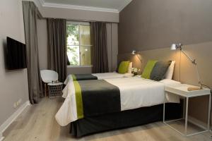 ブエノスアイレスにあるSuMa Recoleta Hotelのベッドルーム(大型ベッド1台、窓付) +36枚の写真