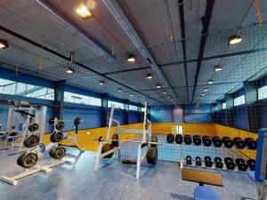 Posilňovňa alebo fitness centrum v ubytovaní Hotel Ski Austria St.Christoph a.A.