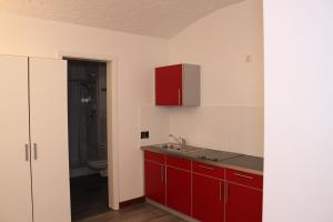 Kuchyň nebo kuchyňský kout v ubytování GLS Studio Hotel Berlin