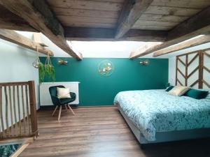 Ένα ή περισσότερα κρεβάτια σε δωμάτιο στο Appartement indépendant La tour des Tuileries