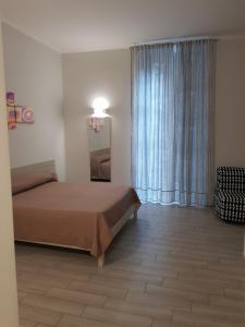 Postel nebo postele na pokoji v ubytování B&b ONE