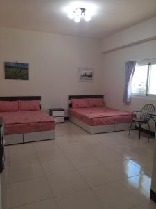Voodi või voodid majutusasutuse Jun Le Bed and Breakfast toas