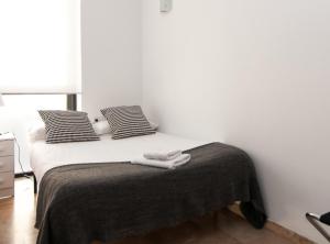 Postel nebo postele na pokoji v ubytování Picasso Suites