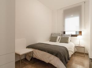 Postel nebo postele na pokoji v ubytování Picasso Suites