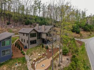 an aerial view of a house with a yard at Lucky Landing at Blue Ridge Mountain Club in Boone