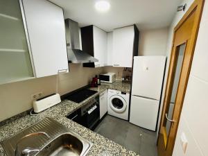 Kuchyňa alebo kuchynka v ubytovaní La Faroleta Puerto