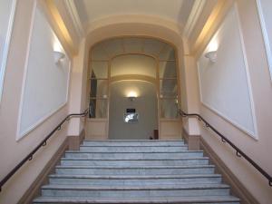 a set of stairs in a building with a hallway at Appartements Nice Centre Carré d’or in Nice +8 photos