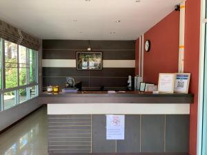 The lobby or reception area at The Orchid House