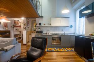 Kuchyň nebo kuchyňský kout v ubytování Loft in Testaccio