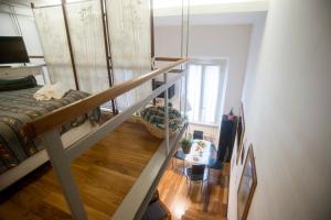 Postel nebo postele na pokoji v ubytování Loft in Testaccio