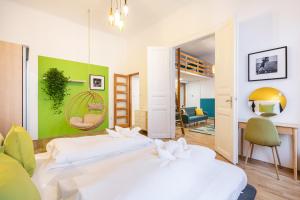 Posteľ alebo postele v izbe v ubytovaní Live Star Apartment