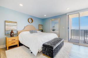 a bedroom with a bed and a large window at Sea Colony Ocean --- 1205N Edgewater House in Bethany Beach +30 photos