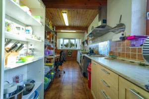 Kuchyň nebo kuchyňský kout v ubytování Penzion U Zatoky
