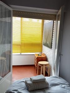 A bed or beds in a room at Piso céntrico ideal