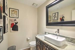 a bathroom with a sink and a mirror at Comfortable Dallas Condo Close to Attractions in Dallas +16 photos