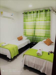 Hotel Don Jose客房内的一张或多张床位