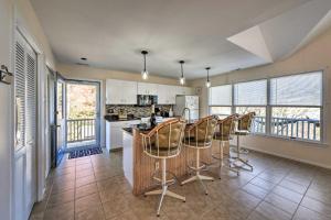 a kitchen with a table and chairs in a room at Seaside Escape Less Than 1 Mi to Cape May Public Beach in West Cape May