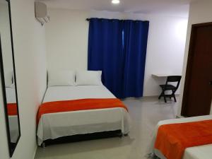 Hotel Don Jose客房内的一张或多张床位