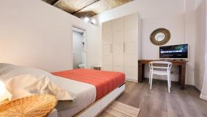 Postel nebo postele na pokoji v ubytování Casa Volsci, 2 camere 2 bagni, Roma centro
