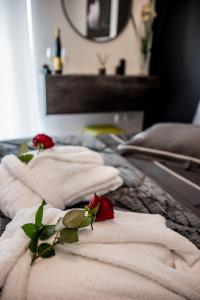 Postel nebo postele na pokoji v ubytování Escape Luxury Apartment