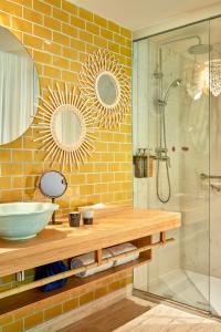 a bathroom with a sink and a shower at Bikini Island & Mountain Port de Soller "Adults only" in Port de Soller