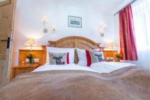 Posteľ alebo postele v izbe v ubytovaní Panorama & SPA Apartment Kaiser Franz Josef I im Schillerhof