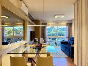 Posezení v ubytování Apartamentos VENTURA a 5 min do CENTRO by Achei Gramado