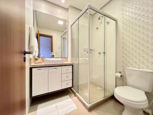 Koupelna v ubytování Apartamentos VENTURA a 5 min do CENTRO by Achei Gramado + 95 fotografií