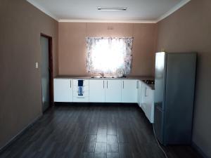 Kuchyň nebo kuchyňský kout v ubytování NAMU Apartments