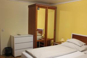 Postel nebo postele na pokoji v ubytování Hotel Altneudörflerhof