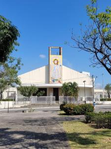 a building with a mural on the side of it at Inter Hotel in Vitória