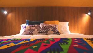 Letto o letti in una camera di Hotel Inti Quito