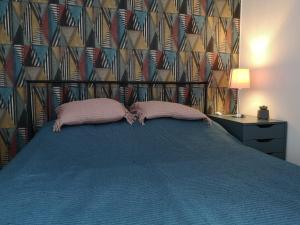 מיטה או מיטות בחדר ב-Apartament dla Ciebie