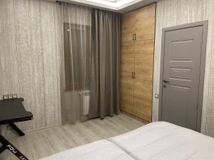 Postel nebo postele na pokoji v ubytování Bonvenon capsule Hostel