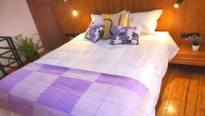 Letto o letti in una camera di Hotel Inti Quito