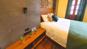 Letto o letti in una camera di Hotel Inti Quito